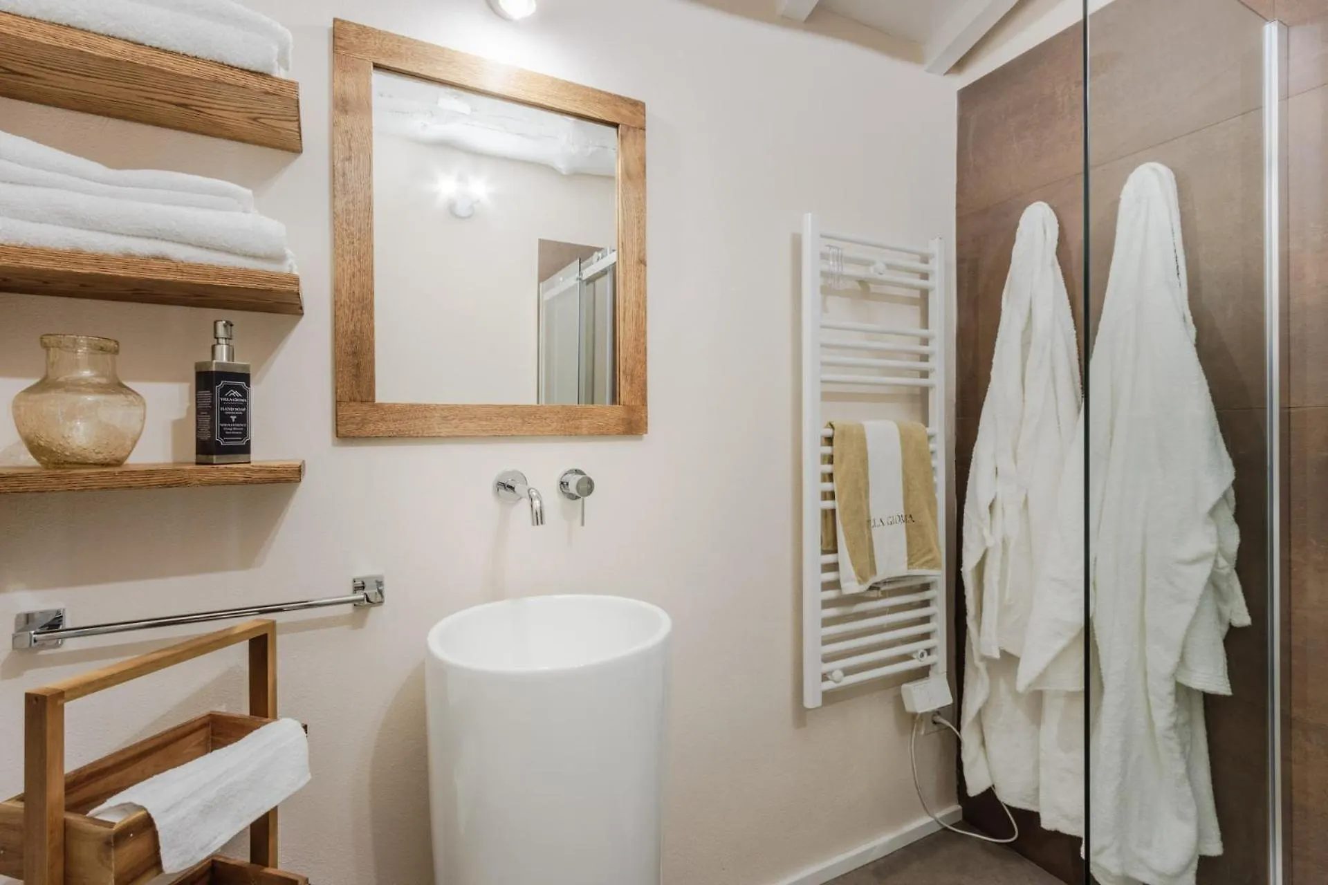 A private bathroom at Villa Gioma with walk-in shower