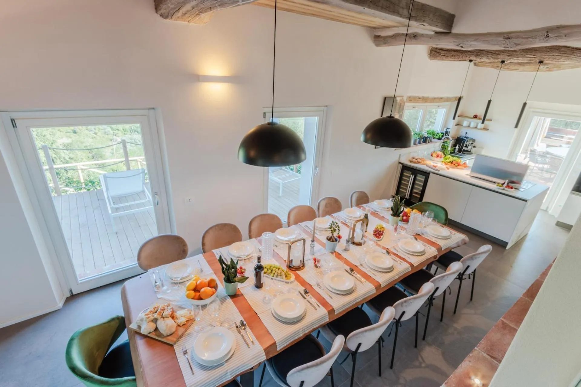 The kitchen at Villa Gioma with the island and the dining room
