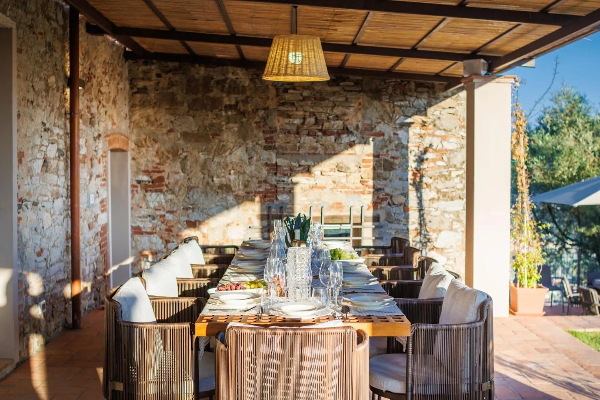 The loggia at Villa Gioma with the table set for fourteen