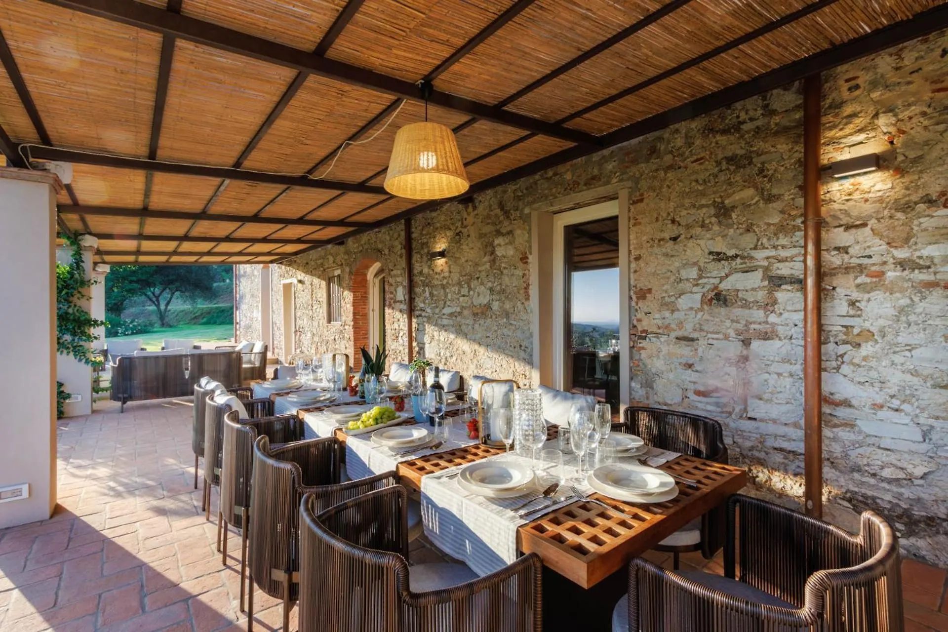 The loggia at Villa Gioma with the table set for fourteen