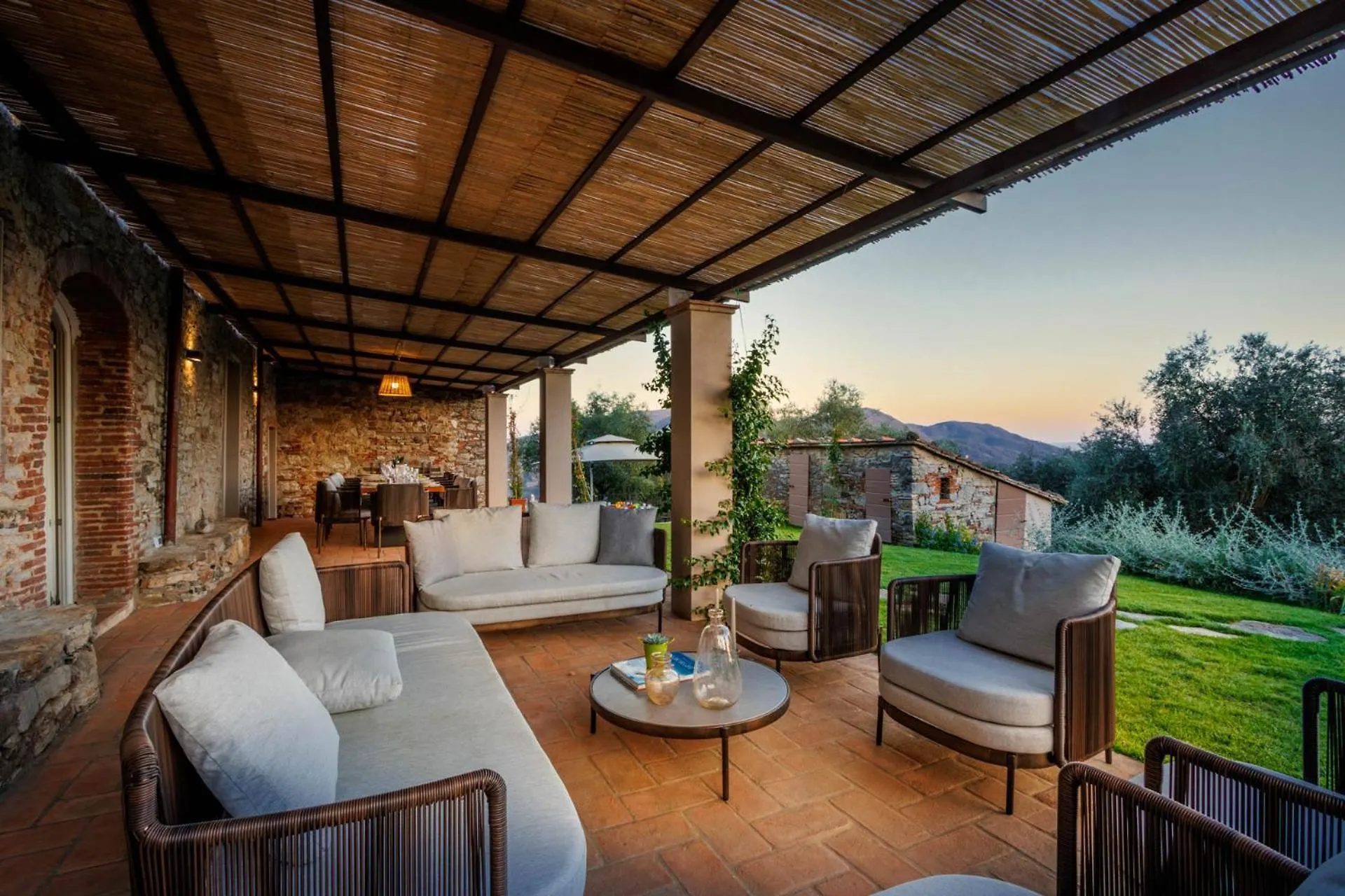 The loggia at Villa Gioma with the table set for fourteen