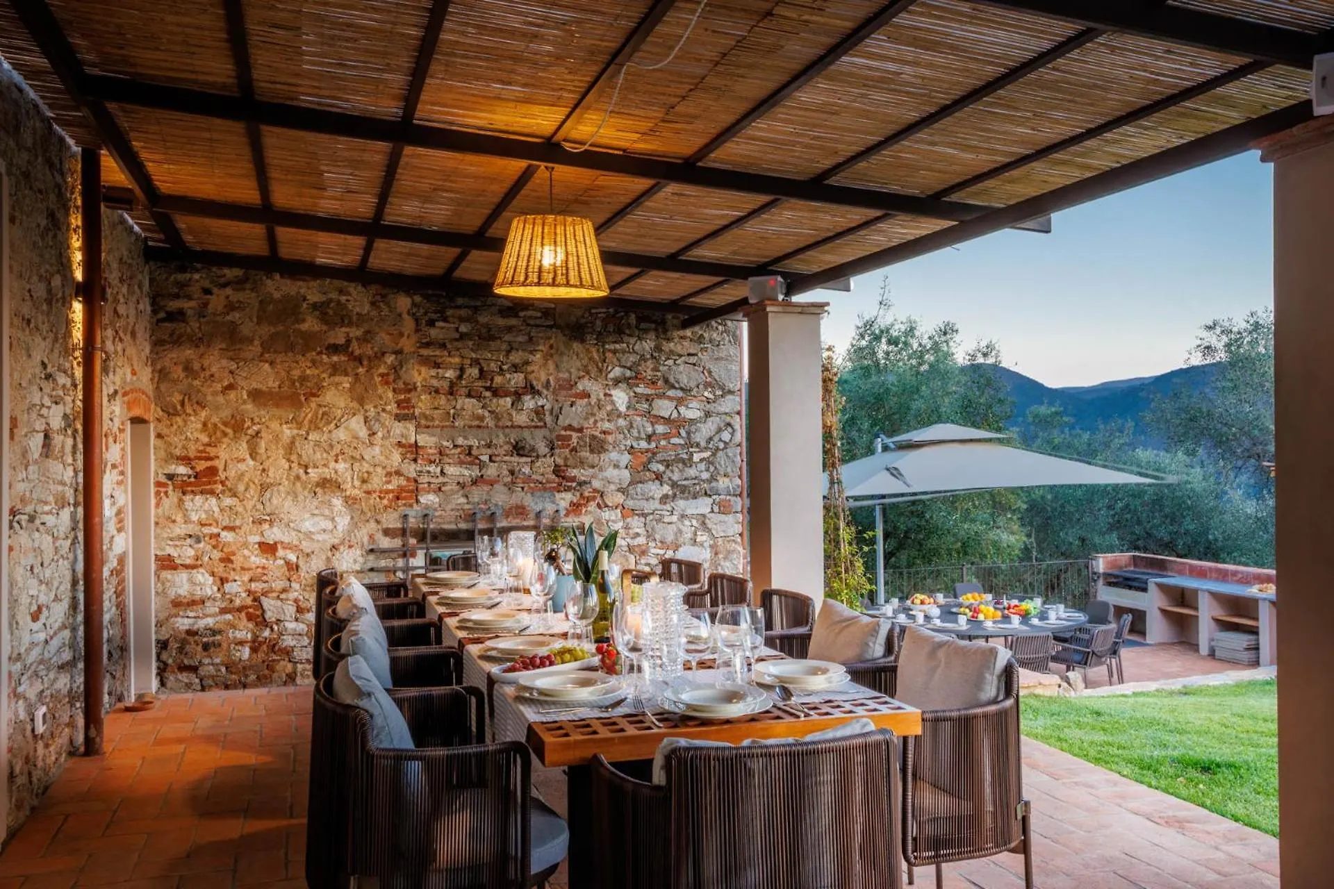 The loggia at Villa Gioma with the table set for fourteen